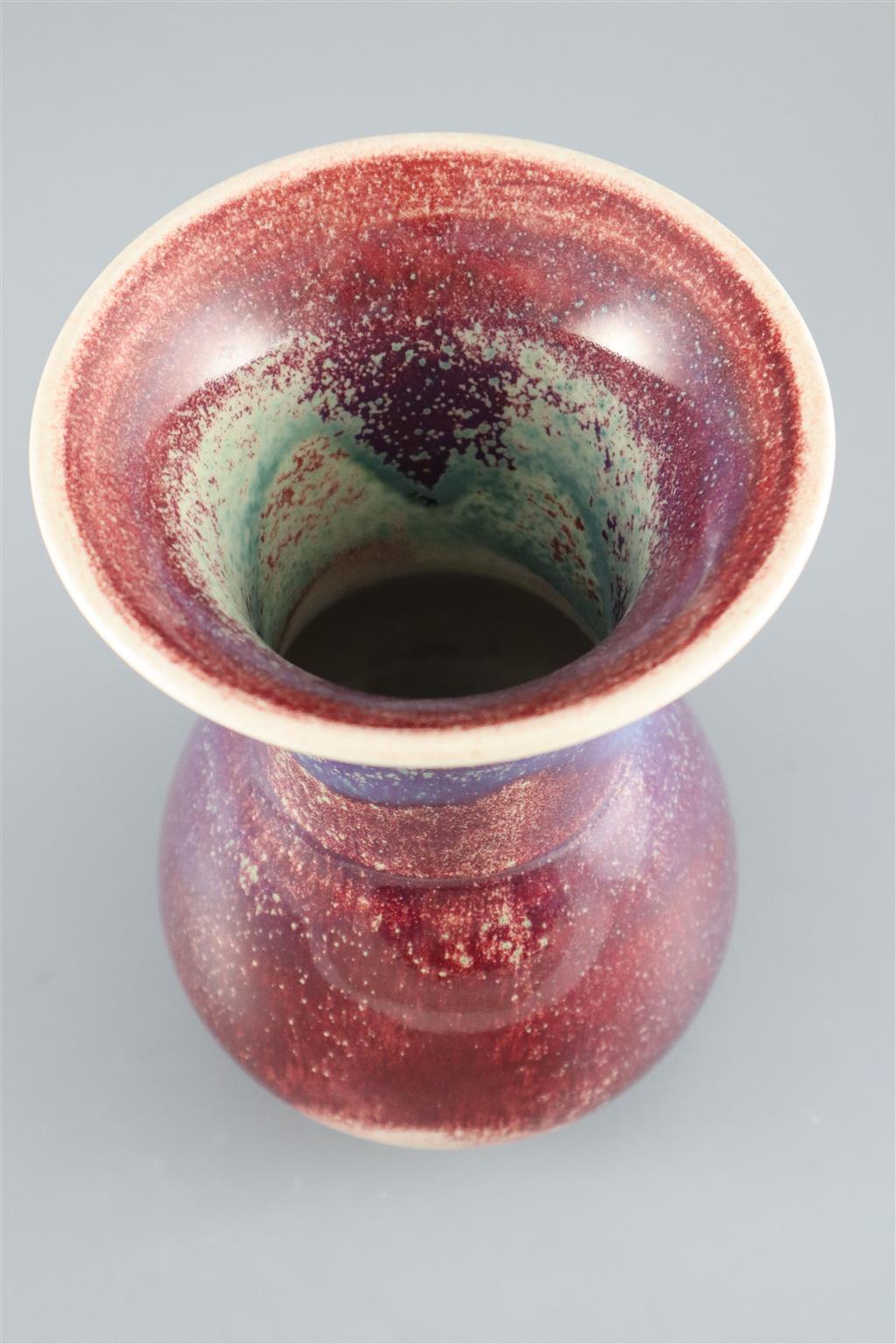 A Ruskin high fired flambe glazed vase, dated 1911, 22cm high